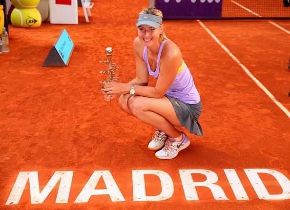 Maria Sharapova battles past Simona Halep to clinch Madrid title