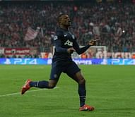 Manchester United retain Patrice Evra but release Federico Macheda