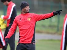 Patrice Evra signs a new deal at Manchester United