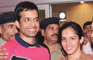 Saina Nehwal with her coach Pullela Gopichand