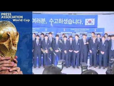 South Korea football team receives a hostile welcome on returning home, pelted with toffees