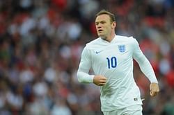 Wayne Rooney lashes out at Paul Scholes' criticism, gets support from David Moyes