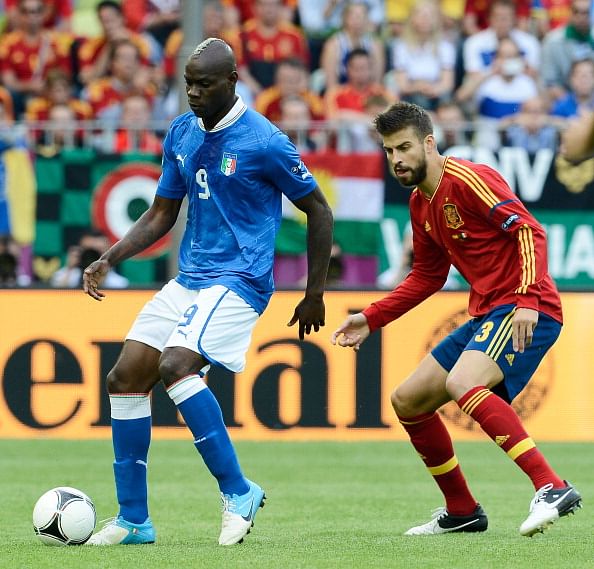 Balotelli against Pique in the Euro 2012 final