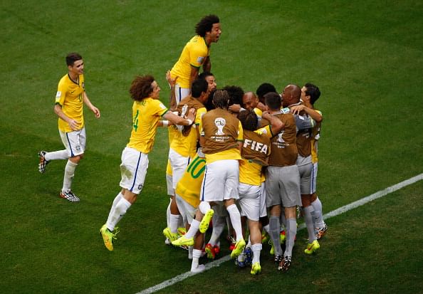 FIFA World Cup 2014 Day 12 Roundup: Netherlands beat Chile to keep perfect record, Brazil and Mexico through to round of 16, Spain win to salvage their pride