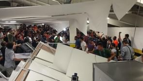Chilean fans break through security barrier at the Maracana; invade press room