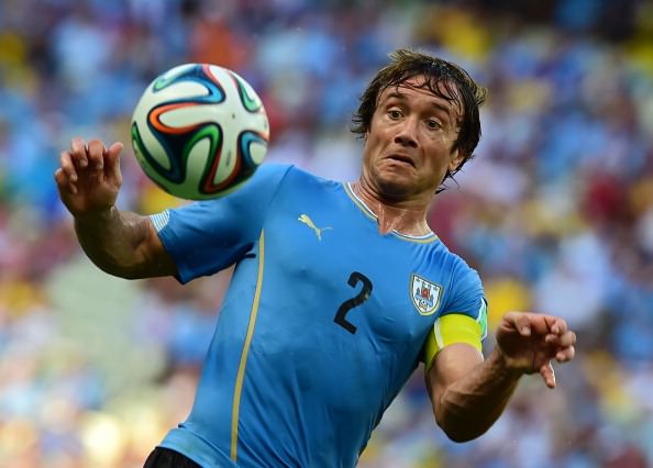 Uruguay captain Diego Lugano ruled out of England clash to open door for Liverpool defender Coates