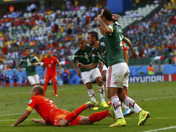 Mexico manager Miguel Herrera claims Arjen Robben dived for crucial penalty