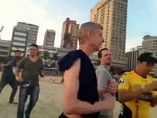 Southampton fan begs Arsene Wenger at Rio beach to not sign Morgan Schneiderlin