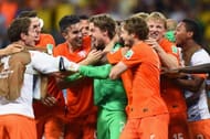 Tim Krul celebrates the quarter-final win against Costa Rica with his team mates