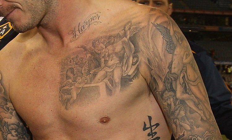 David Beckham reveals chest tattoo of Jesus and angels for first time   Daily Mail Online