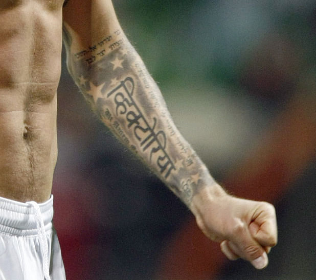 PHOTOS David Beckhams obsession with tattoos explained  Rediffcom