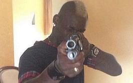 Mario Balotelli posts a photograph of himself posing with a gun on Instagram