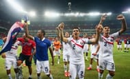Costa Rica players celebrating the win against Greece