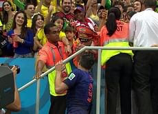 Robin van Persie gives away his 3rd place medal and captain's armband to 'the Oranje General'