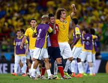 Brazil's David Luiz consoles Colombia's James Rodriguez who was in tears after defeat