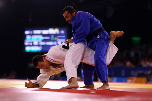Indian judokas Navjot Chana and Sushila Likmabam assured of medals at CWG 2014