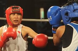 Commonwealth Games 2014: Sarita Devi reaches quarterfinals; Manoj Kumar, Sumit Sangwan ousted