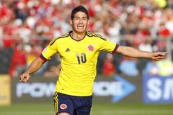 James Rodriguez poses with the World Cup Golden Boot award