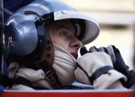 Piers Courage of Great Britain sits aboard the #7 Frank Williams Racing Cars De Tomaso 505 Ford Cosworth DFV V8 before the start of the Belgian Grand Prix on 7th June 1970 at the Circuit National de Francorchamps in Spa Francorchamps, Belgium
