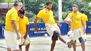 Kerala Blasters play football wearing dhoti during unveiling of team logo