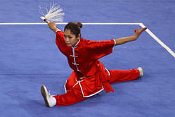 Asian Games 2014: Wushu player Sanathoi Devi assured of bronze, reaches 52-kg semifinals