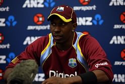 West Indian players stand behind captain Dwayne Bravo at toss before 4th ODI