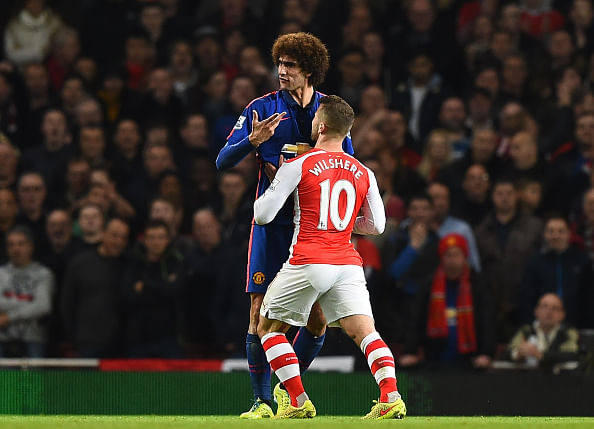 Video: Jack Wilshere lucky to escape punishment after appearing to head-butt Marouane Fellaini