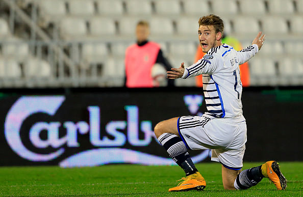 Euro 2016 qualifiers: Nicklas Bendtner scores twice as Denmark defeat Serbia 3-1