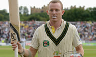 Chris Rogers raises his bat