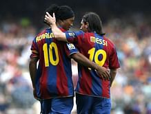 Former Barcelona teammate Ronaldinho congratulates Lionel Messi on his record-breaking acheivement