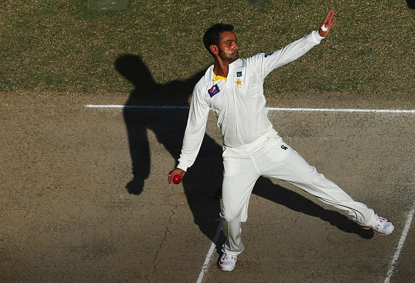 Mohammad Hafeez suspended from bowling in international cricket after action found to be illegal