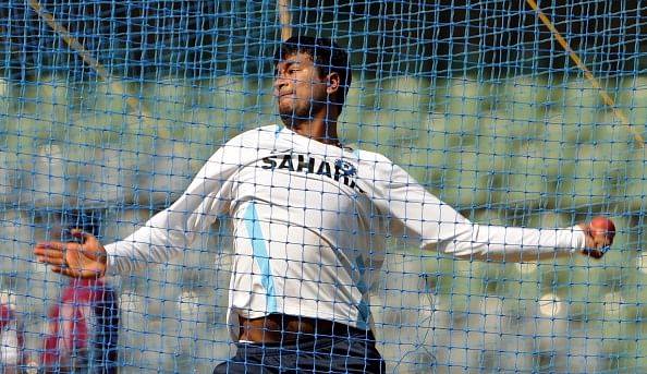 Pragyan Ojha banned from bowling due to suspect bowling action