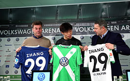 Wolfsburg sign midfielder Zhang Xizhe from Beijing Guoan FC