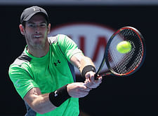 Andy Murray advances to the second round with a straight sets win over Yuki Bhambri