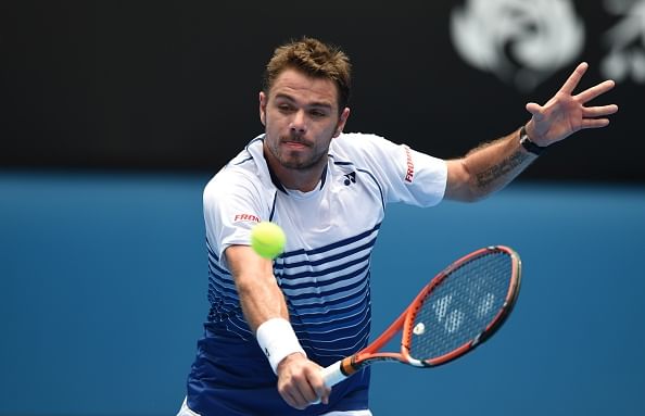 Stan Wawrinka starts his title defense with a comfortable win over Marsel Ilhan