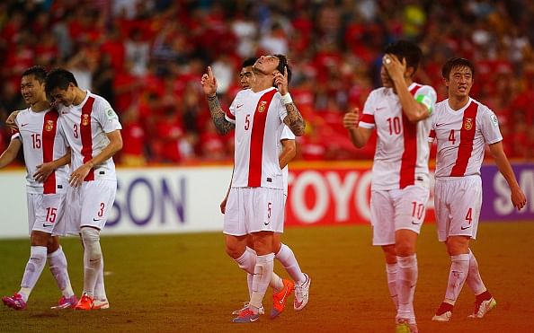 China stun Uzbekistan to reach Asian Cup football quarters