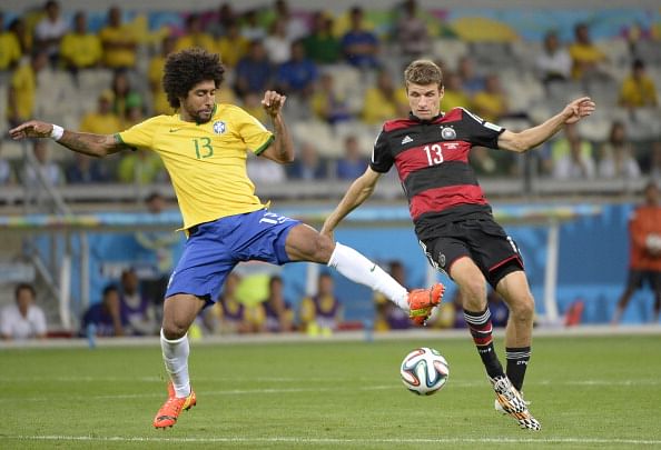 Dante threatens to punch Muller if he doesn't stop the 7-1 jokes