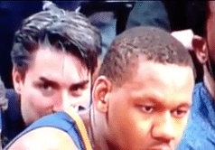 Basketball fan caught sniffing a player on camera