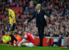 Arsene Wenger says Jack Wilshere will need to fight his way back into the Arsenal starting XI