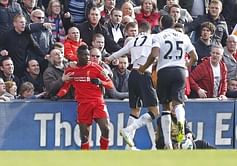 Video: Mario Balotelli held back by Liverpool fans in Chris Smalling bust up