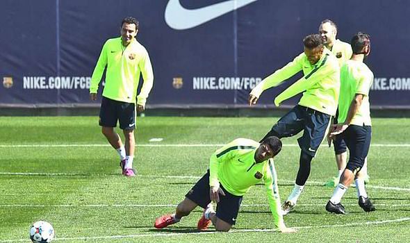 Video: Neymar and Dani Alves playfully kick Luis Suarez in Barcelona training