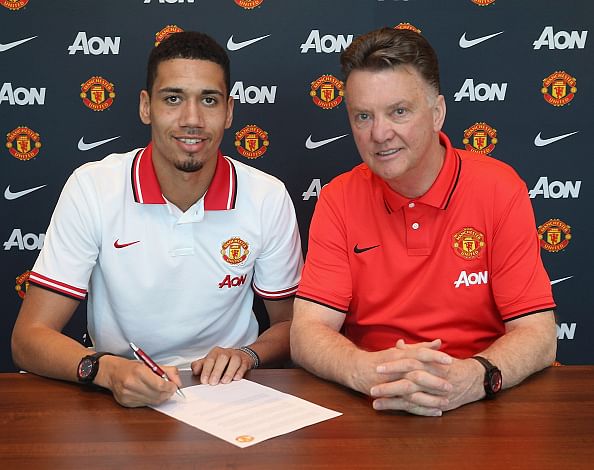 Man United defender Chris Smalling signs a new contract to extend his deal until 2019