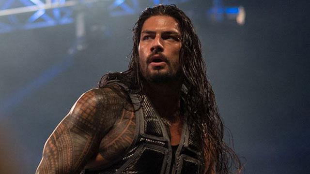 Roman Reigns says he'd "whip Steve Austin's a-- and drink his beer" if they wrestled