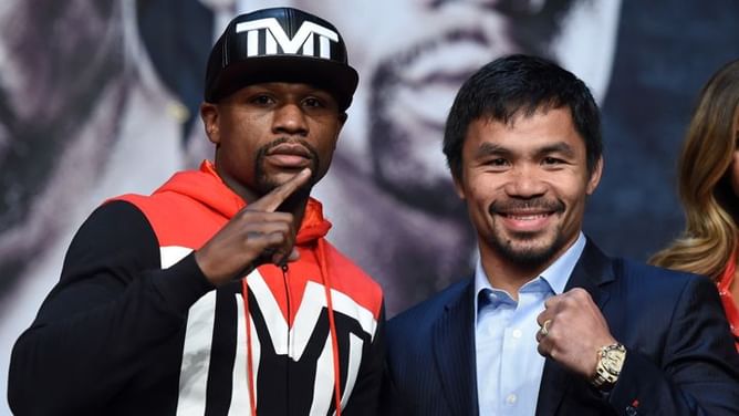 Floyd Mayweather, Manny Pacquiao weigh-in for historic boxing bout