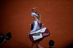 Maria Sharapova wins easily but booed by crowd