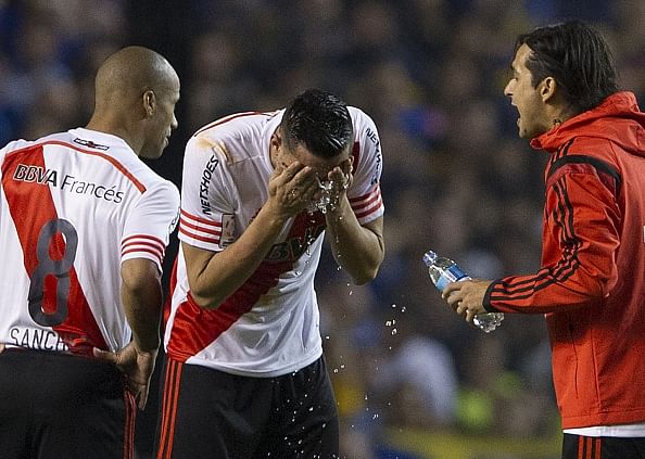 Boca Juniors thrown out of Copa Libertadores for 'spraygate'
