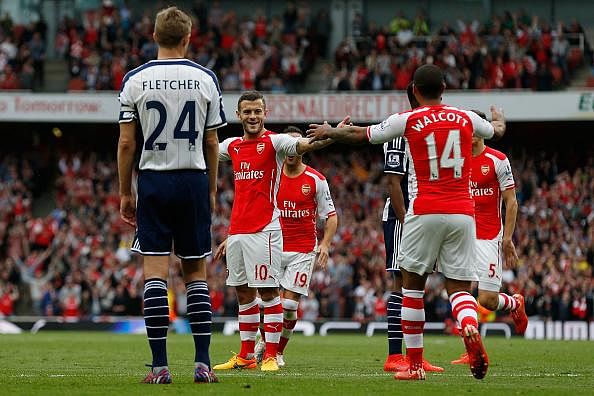 Theo Walcott and Jack Wilshere lay waste to the want-away rumours