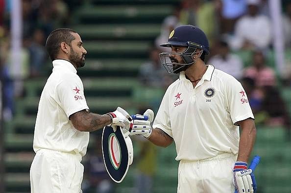 Openers put India on top on rain-marred day