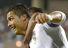 Portugal beat Armenia with Ronaldo hat-trick to go top