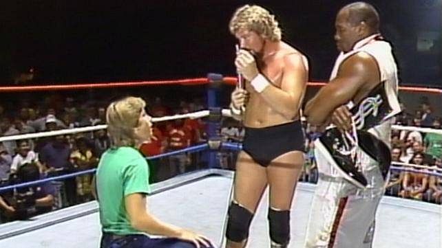 A young RVD gets his first taste (literally) of in-ring action as he gets ready to kiss The Million Dollar Man&acirc;s foot